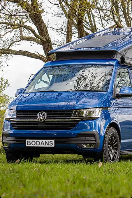 VW Transporter campervan with an OLPRO awning